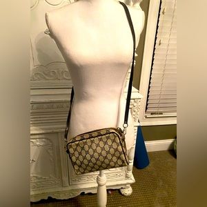Authentic Vintage Gucci monogram, Crossbody purse. Black with gold hardware.